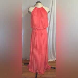 Coral pleated floor length gown